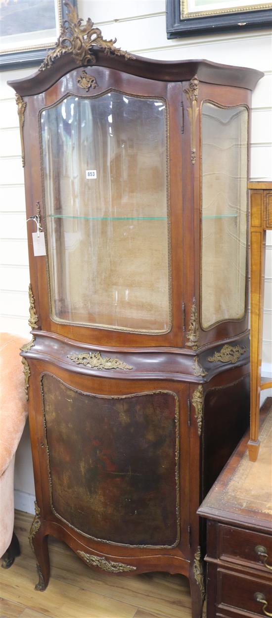 A vitrine display cabinet, H.190cm